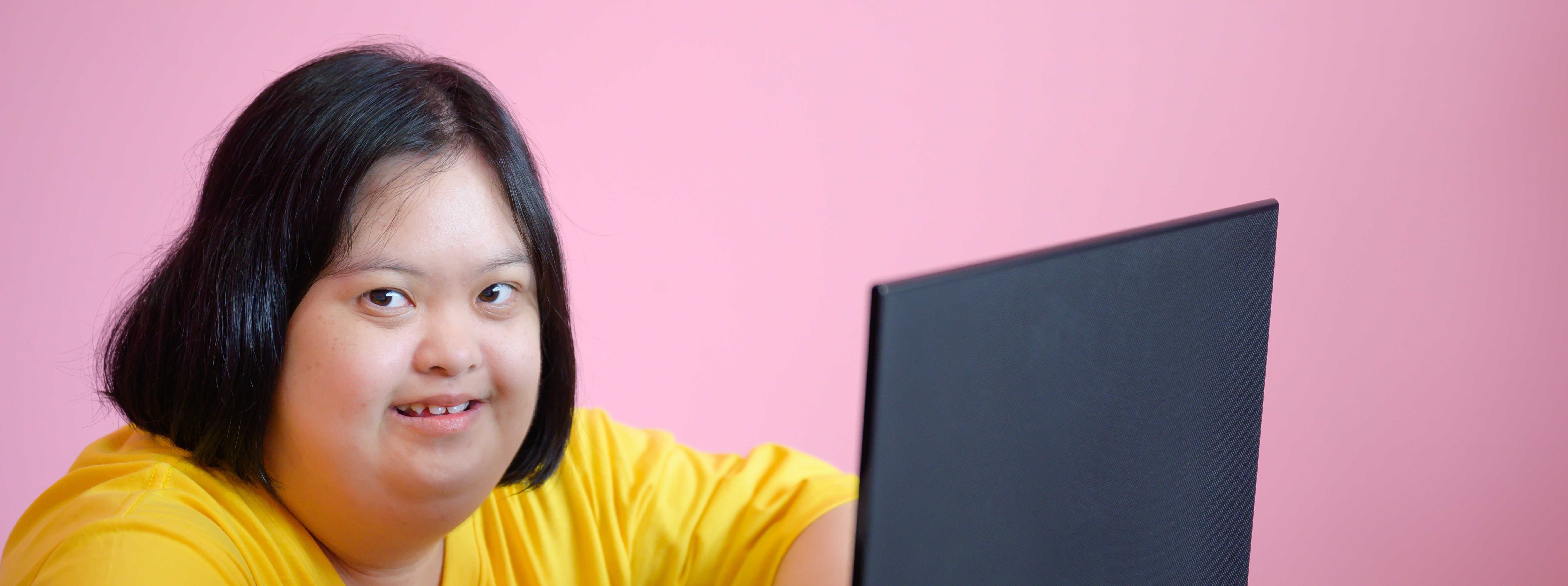 A woman working on a laptop