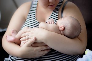 Mother holding newborn baby