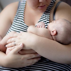 Mother holding newborn baby