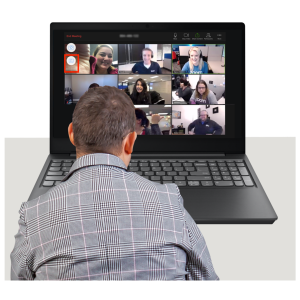 A man taking part in a Zoom meeting on a laptop