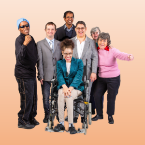A group of people stand or sit in wheelchairs in a group